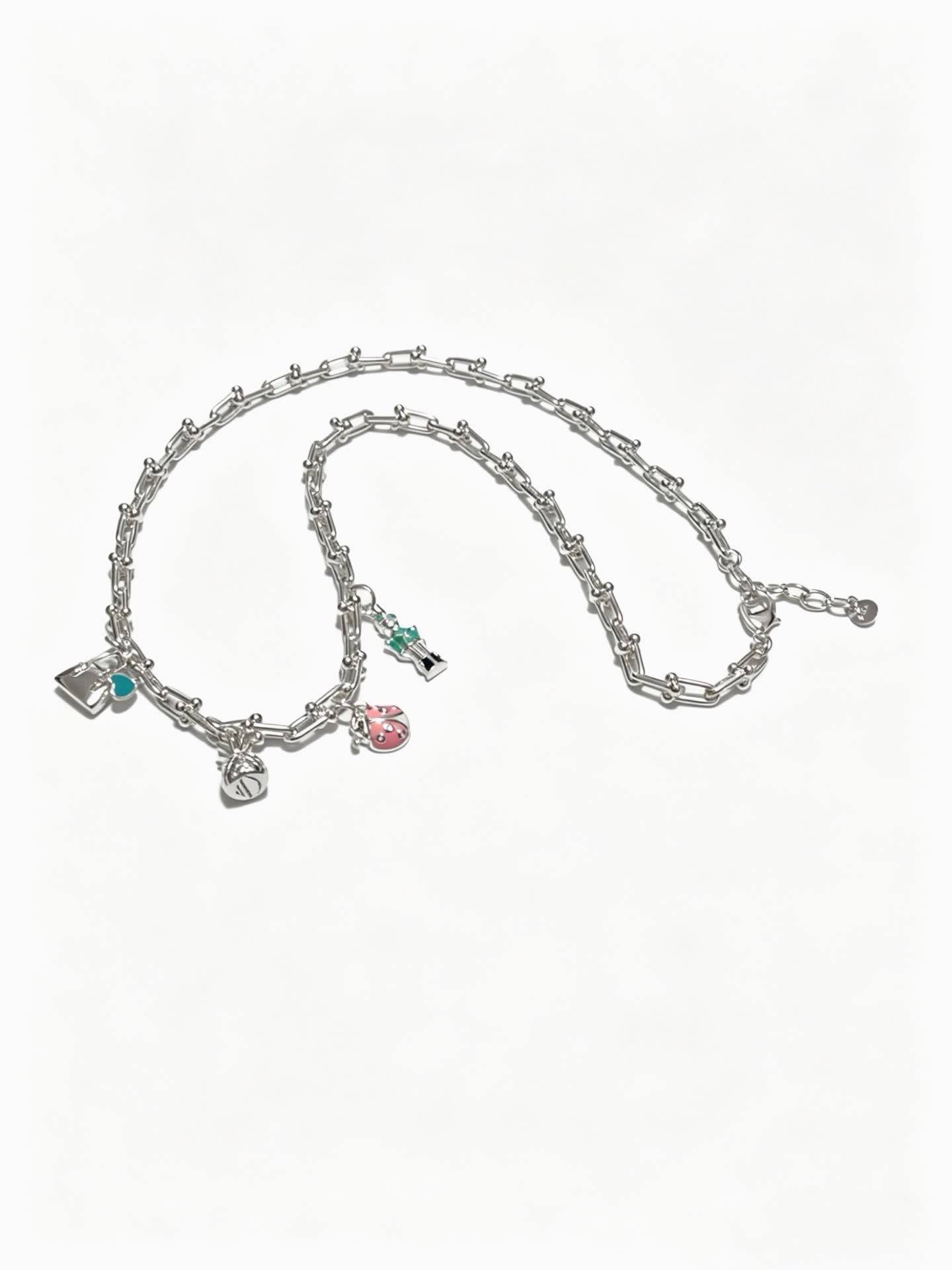 Tiffany & Co. Silver Charm Necklace